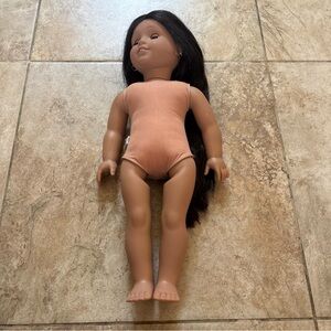 American Girl Doll with Black Hair and Tan Outfit
